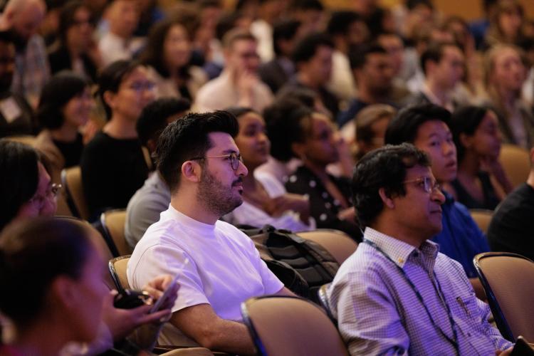 Students sitting in a theatre