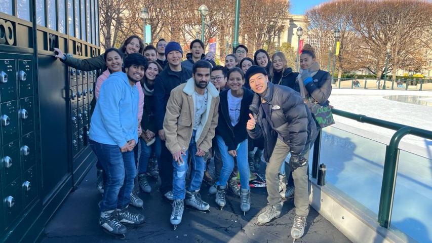 Students in Ice Skates next to a Skating Rink